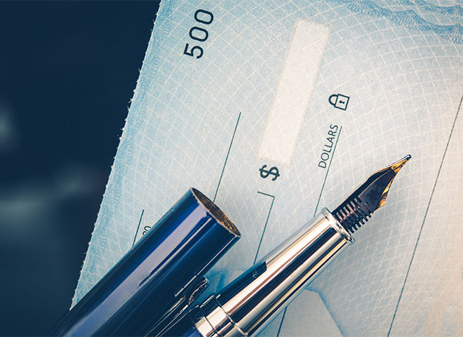 Pen and bank check