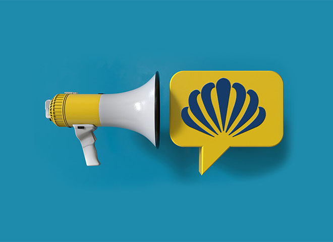 Bullhorn and speech bubble with the DCFCU logo